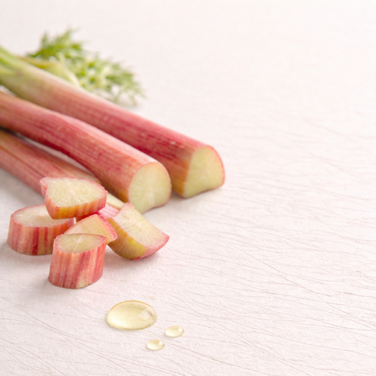 Sliced rhubarb on a textured white surface
rhubarb extract 
oil soluble 
oil extract rhubarb 
rhubarb 
British cosmetic ingredient